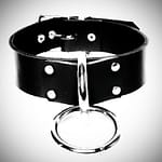 Black and white photo of bondage collar with ring