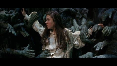 Labyrinth: Sarah held up by Helping Hands